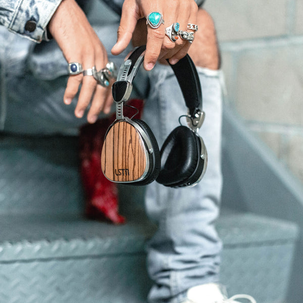 Wireless Zebra Wood Troubadours 2.0 Violins, pianos, guitars — world-class musical instruments are made from wood, so why not headphones? Our real zebra wood housings provide excellent tonal balance with crisp highs and rich lows.